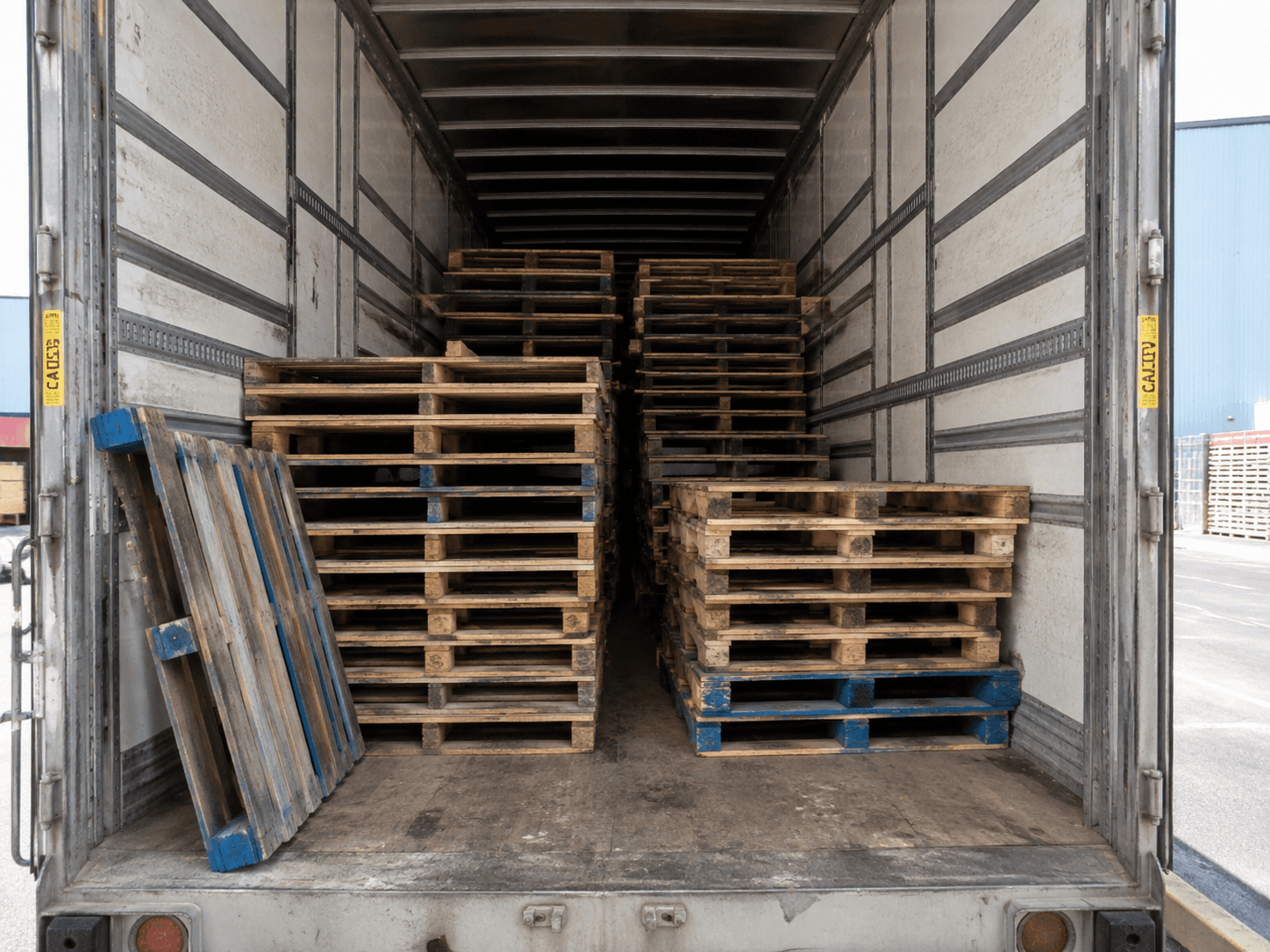 A box truck loaded with pallets for delivery